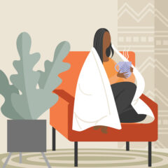 Illustration of a woman sat with her feet up on an armchair. She's wrapped in a blanket, holding a steaming mug.