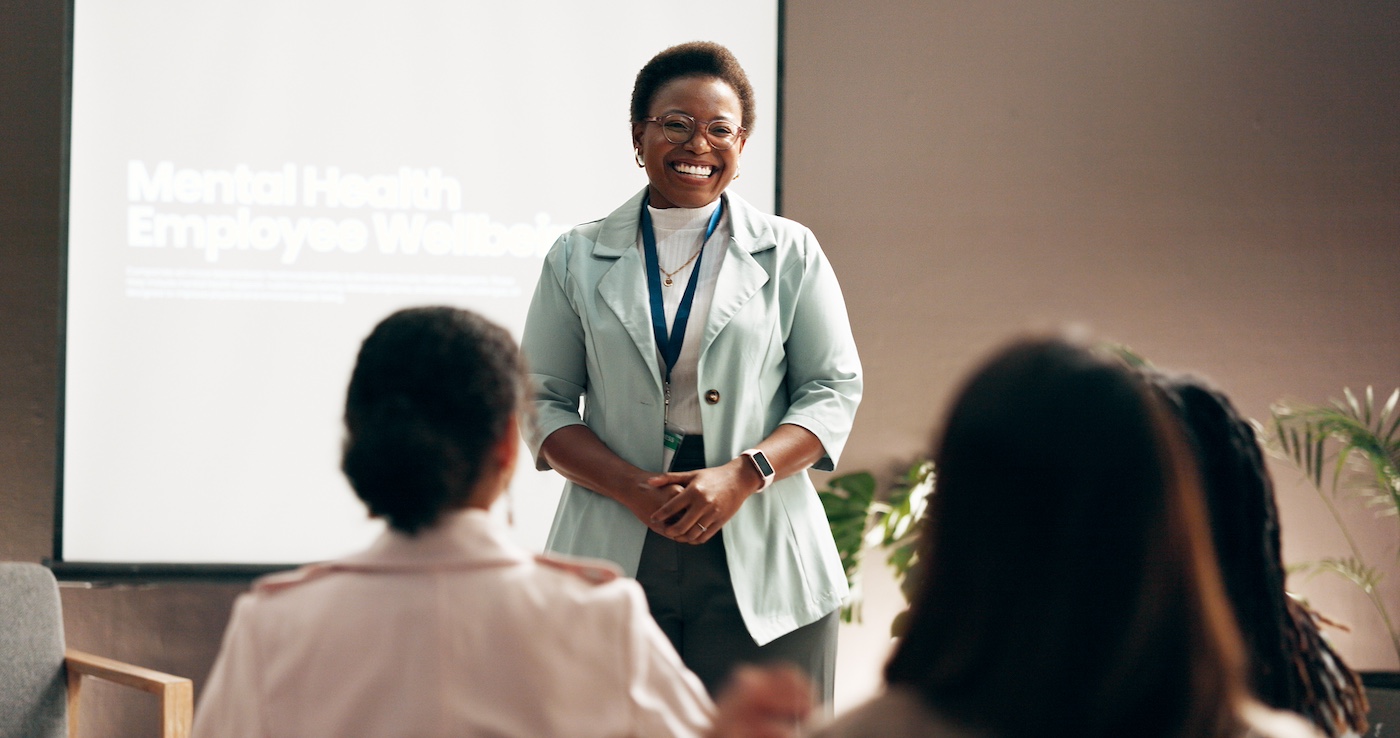 Person presenting to a group for mental health program