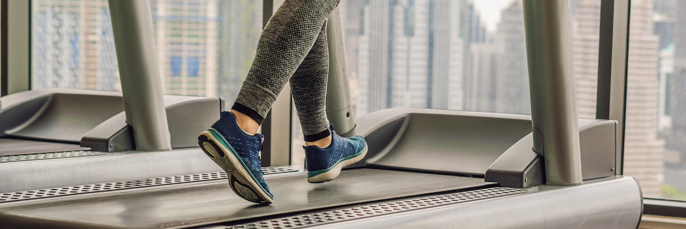 Person exercising on treadmill